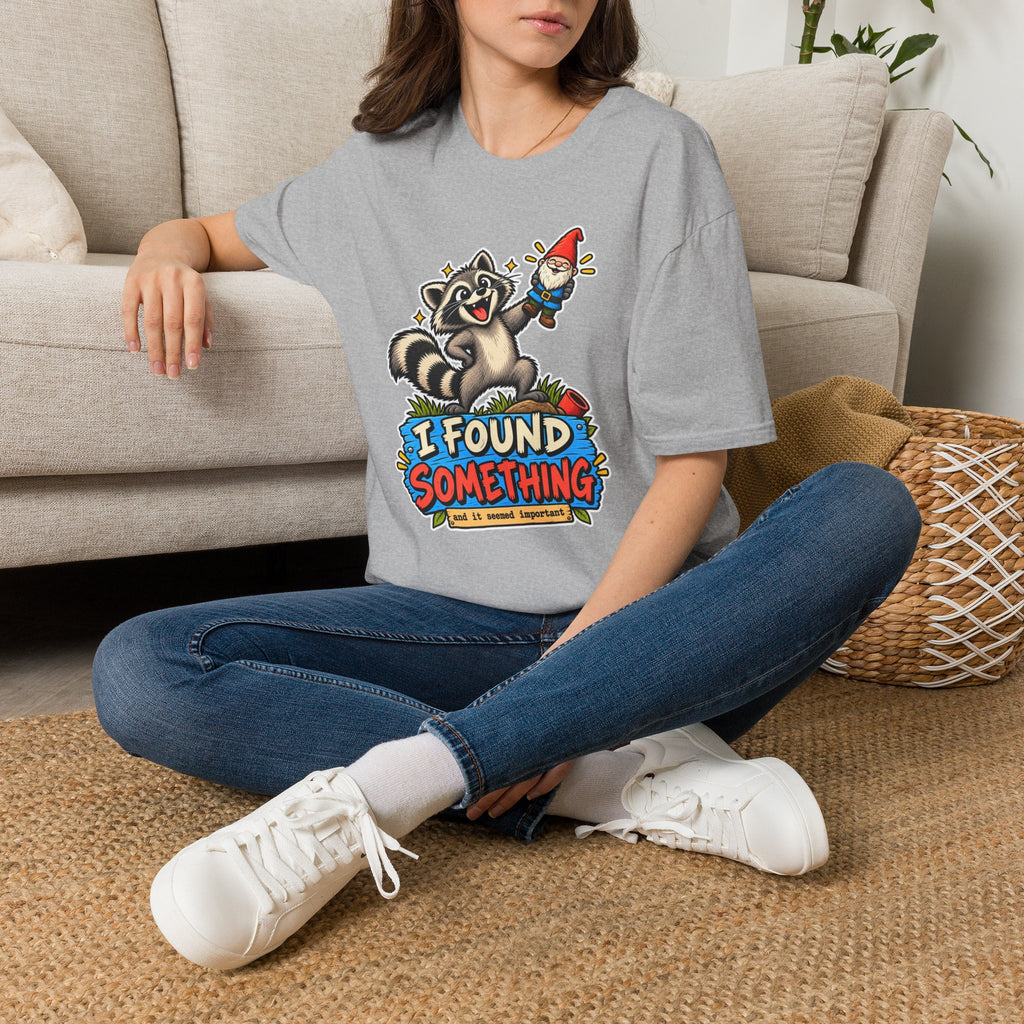 Playful Raccoon Holding Garden Gnome T-Shirt | I Found Something Graphic Tee