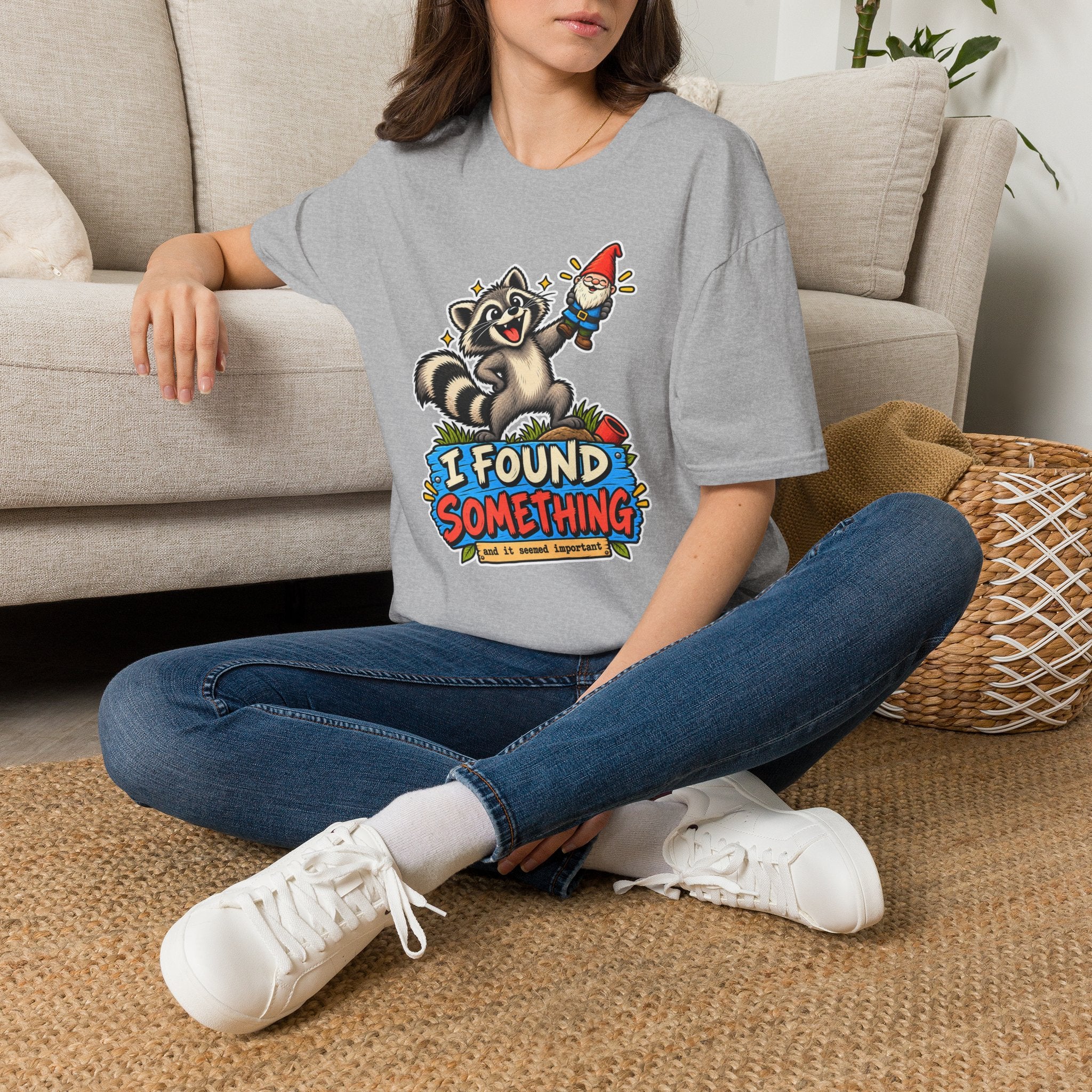 Playful Raccoon Holding Garden Gnome T-Shirt | I Found Something Graphic Tee