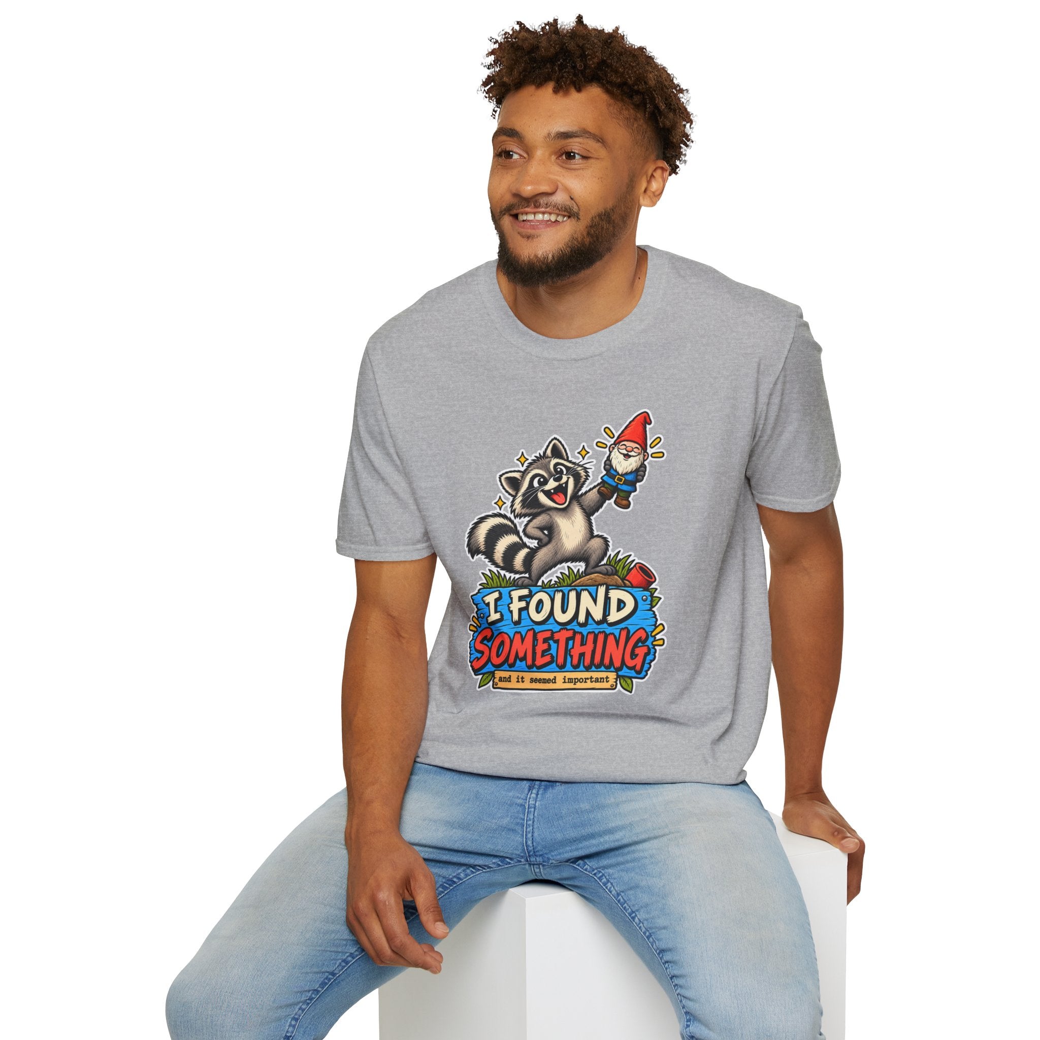 Playful Raccoon Holding Garden Gnome T-Shirt | I Found Something Graphic Tee